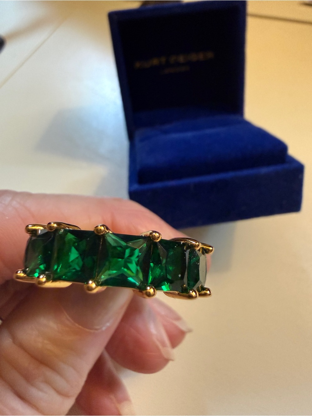 Kurt Geiger Gold Ring with Emerald Green Stones